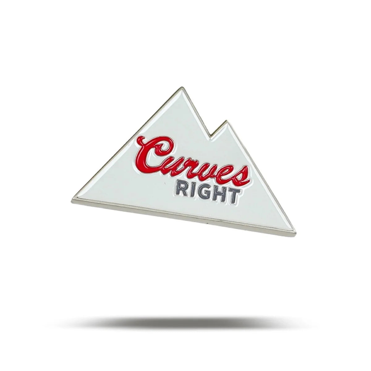 The Curves Right enamel pin by Bogey Bros features a white, triangular mountain design with "Curves" in red script and "RIGHT" in gray block letters, echoing the shape of a sliced golf shot. A subtle shadow rests below the pin.