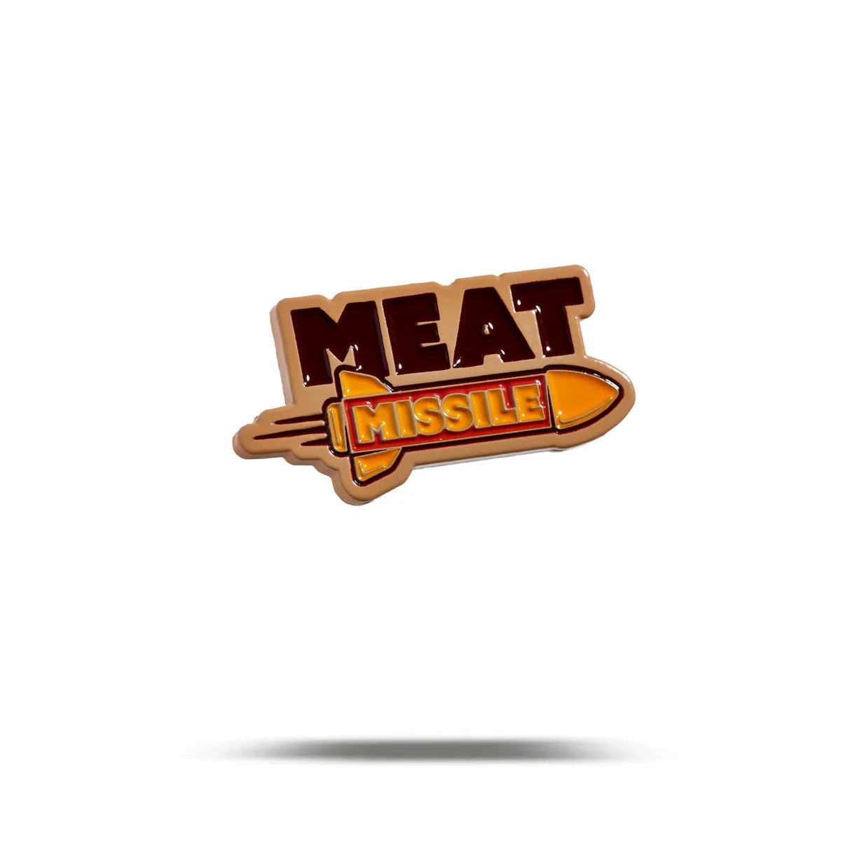 Show your love for tasty buns with the Bogey Bros Meat Missile pin—a missile-shaped design featuring "MEAT" in bold brown and "MISSILE" in yellow inside an orange illustration.