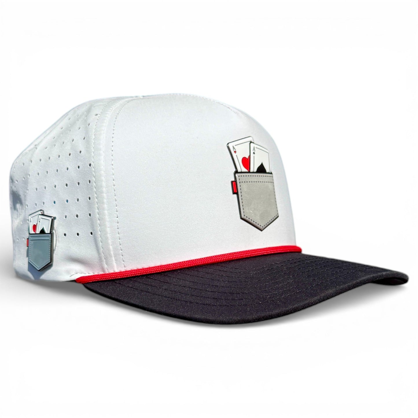 The Logie Joe's Golf Pocket Aces Snapback Cap is a gray and black adjustable golf hat with a built-in magnetic ball marker holder and included marker, featuring a pocket graphic with playing cards for stylish rounds.