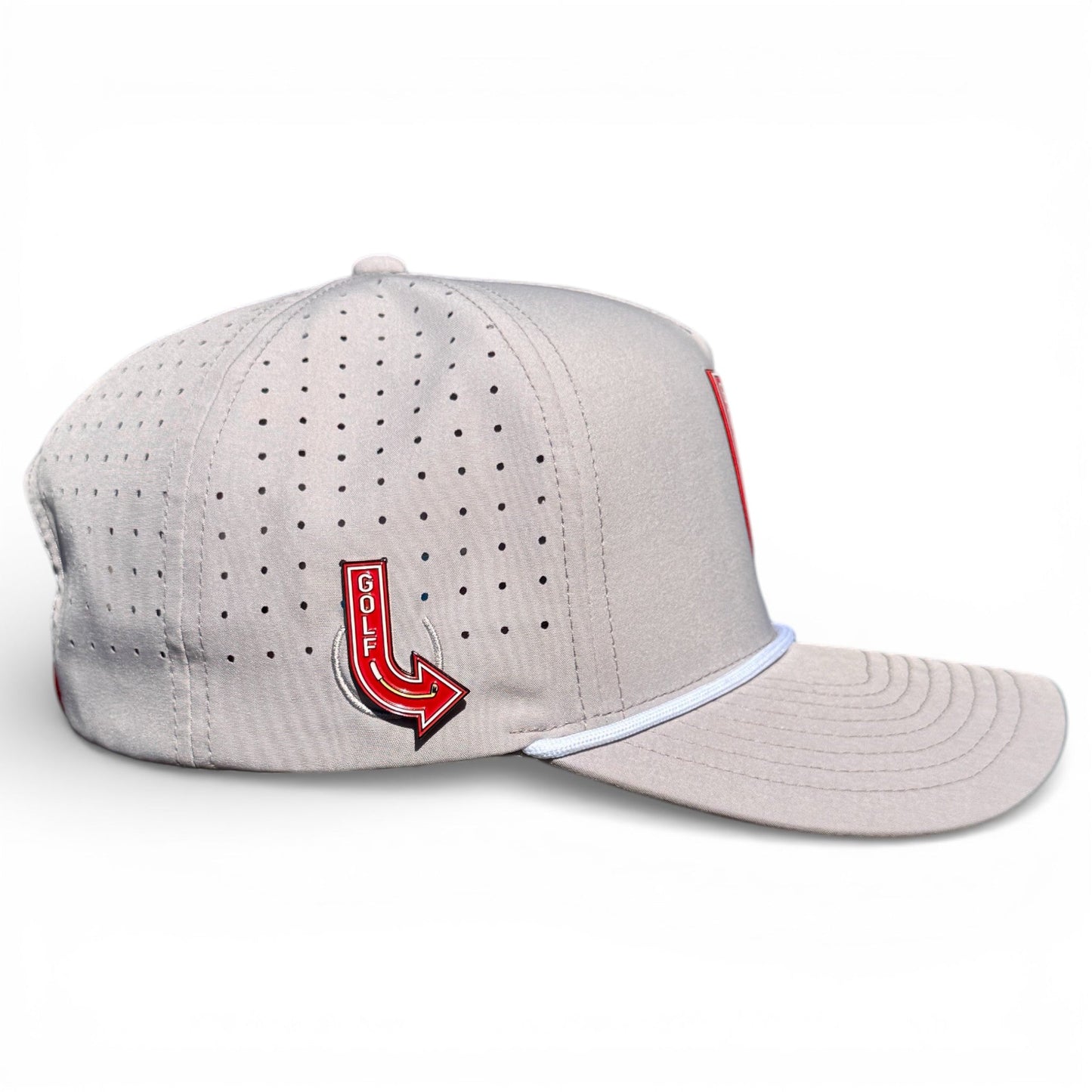 Logie Joe's Golf Neon Arrow Sign Snapback Cap in light gray with ventilation holes, white trimmed brim, and included magnetic ball marker. Features a red and yellow arrow-shaped pin. Adjustable fit. Plain white background.