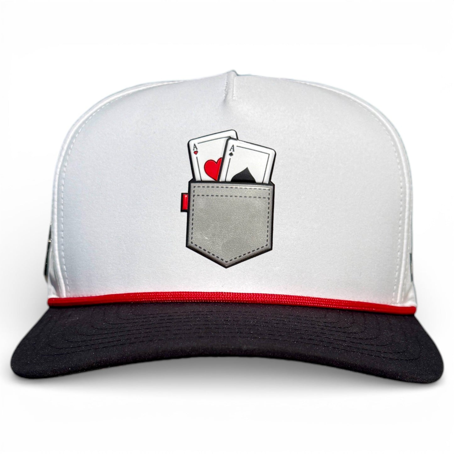 The Pocket Aces Golf Hat by Logie Joe’s Golf is a stylish gray and black snapback cap with a magnetic ball marker holder, featuring pocket aces artwork—perfect for every golfer. Adjustable fit; marker included.