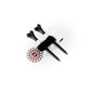Two black free tees and a circular red and white ball marker are secured by a black and white The Byrd, LLC CLYP in the White Swan design, displayed against a white background.