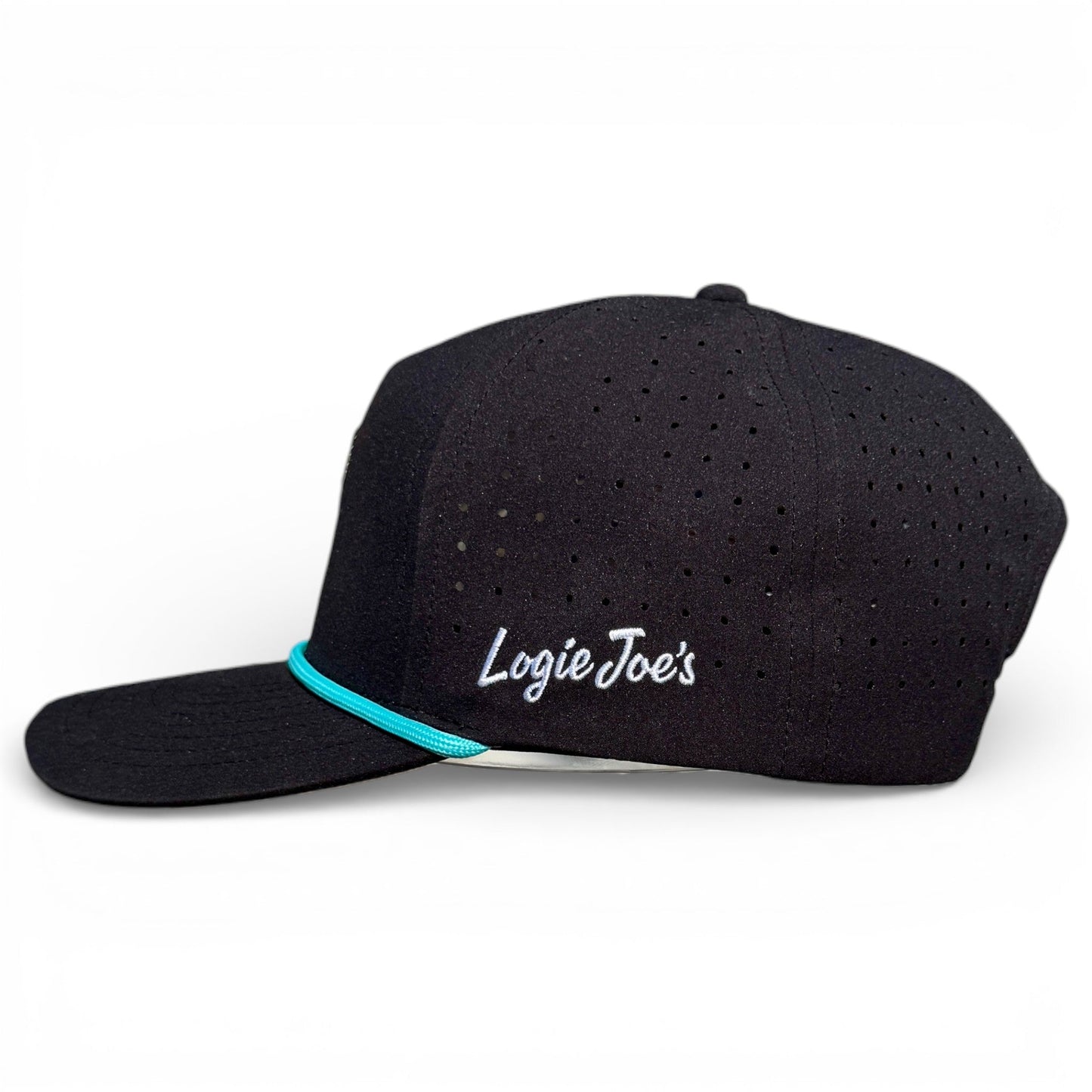 The Shark Bite Golf Hat by Logie Joe’s Golf features a snapback design, built-in magnetic ball marker holder (marker included), and an adjustable fit—perfect for the course.