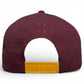 The image shows the back of a maroon Logie Joe's Golf Cold One Snapback Cap, featuring small perforated holes, a yellow adjustable strap, and a built-in magnetic ball marker holder. The background is white.