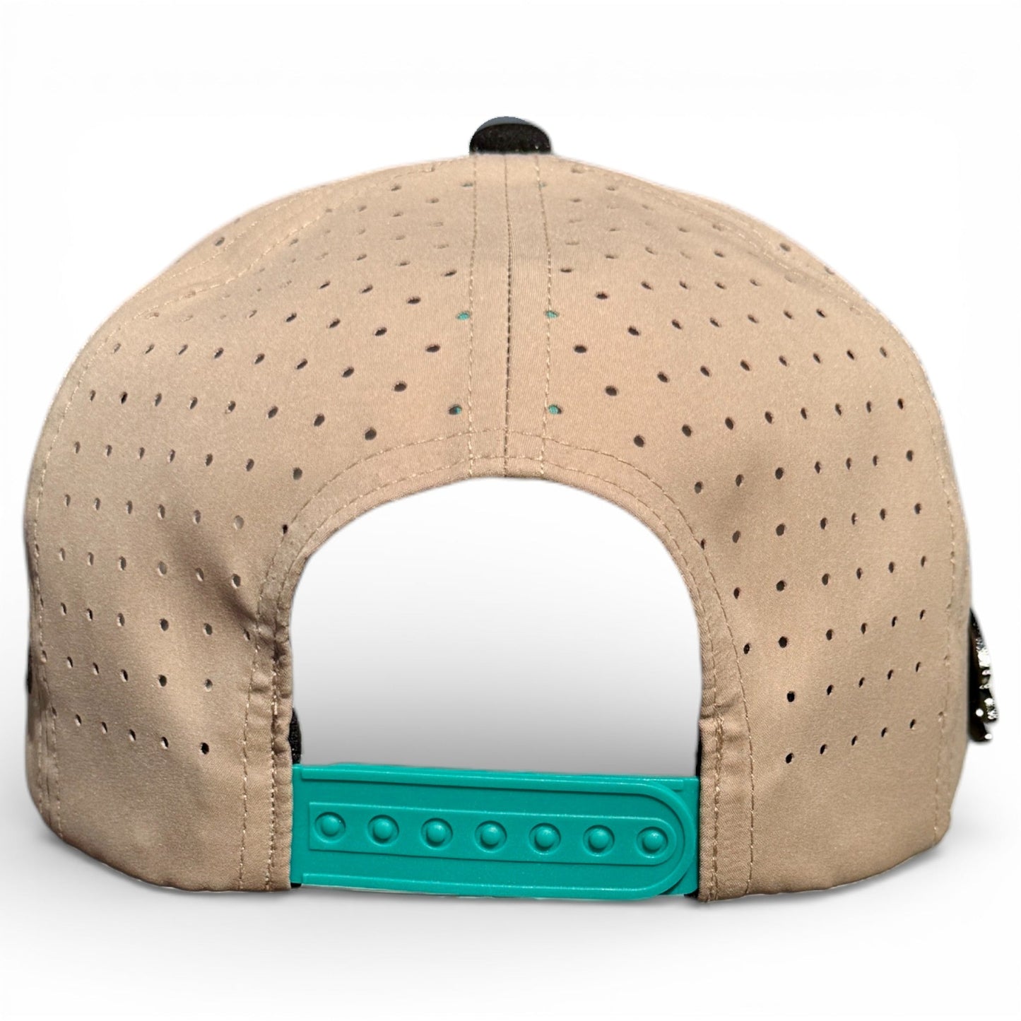The Salty Turtle Golf Hat by Logie Joe's Golf is a beige snapback cap with ventilation holes and an adjustable teal closure, featuring a built-in magnetic ball marker holder plus marker—perfect for every round.