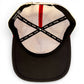 The inside of the Logie Joe's Golf Pocket Aces gray and black snapback cap features black sweatbands with white logos, perforated white lining, a red "MAKE YOUR MARK" strip, and a built-in magnetic ball marker holder with marker included.