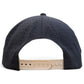 Here’s a revised version using your product data: Back view of the Logie Joe’s Golf Outlaw Golf Hat in black, featuring small ventilation holes and a beige adjustable snapback closure. This cap includes a built-in magnetic ball marker holder for added convenience on the course and comes complete with its own marker.