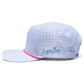 The Sugar Rush Golf Hat by Logie Joe’s Golf is a light blue snapback with adjustable fit, pink brim trim, small ventilation holes, built-in magnetic ball marker holder with marker included, and “Logie Joe’s” embroidered in blue on the side.