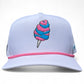 The Sugar Rush Golf Hat by Logie Joe's Golf is a white snapback cap with a pink brim, cotton candy graphic, adjustable fit, and comes with a built-in magnetic ball marker holder plus marker.