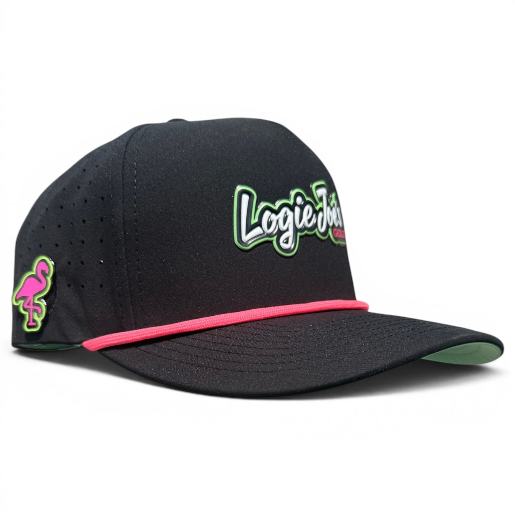 The Logie Joe’s "Classic" Golf Hat by Logie Joe's Golf is a black snapback cap with white and green script logo, a pink flamingo patch, pink accent above the brim, built-in magnetic ball marker holder, and adjustable fit.