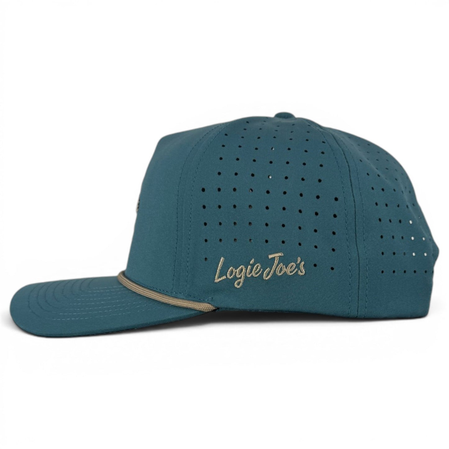 Sure! Here’s the rewritten sentence using your product data: The Deep Dive Golf Hat by Logie Joe’s Golf is a teal adjustable snapback cap featuring perforated holes for ventilation, “Logie Joe’s” embroidered in tan on the side, and a flat brim with a tan decorative band above it. This stylish scuba diver–inspired golf hat also includes a built-in magnetic ball marker holder with marker included for added convenience on the course.