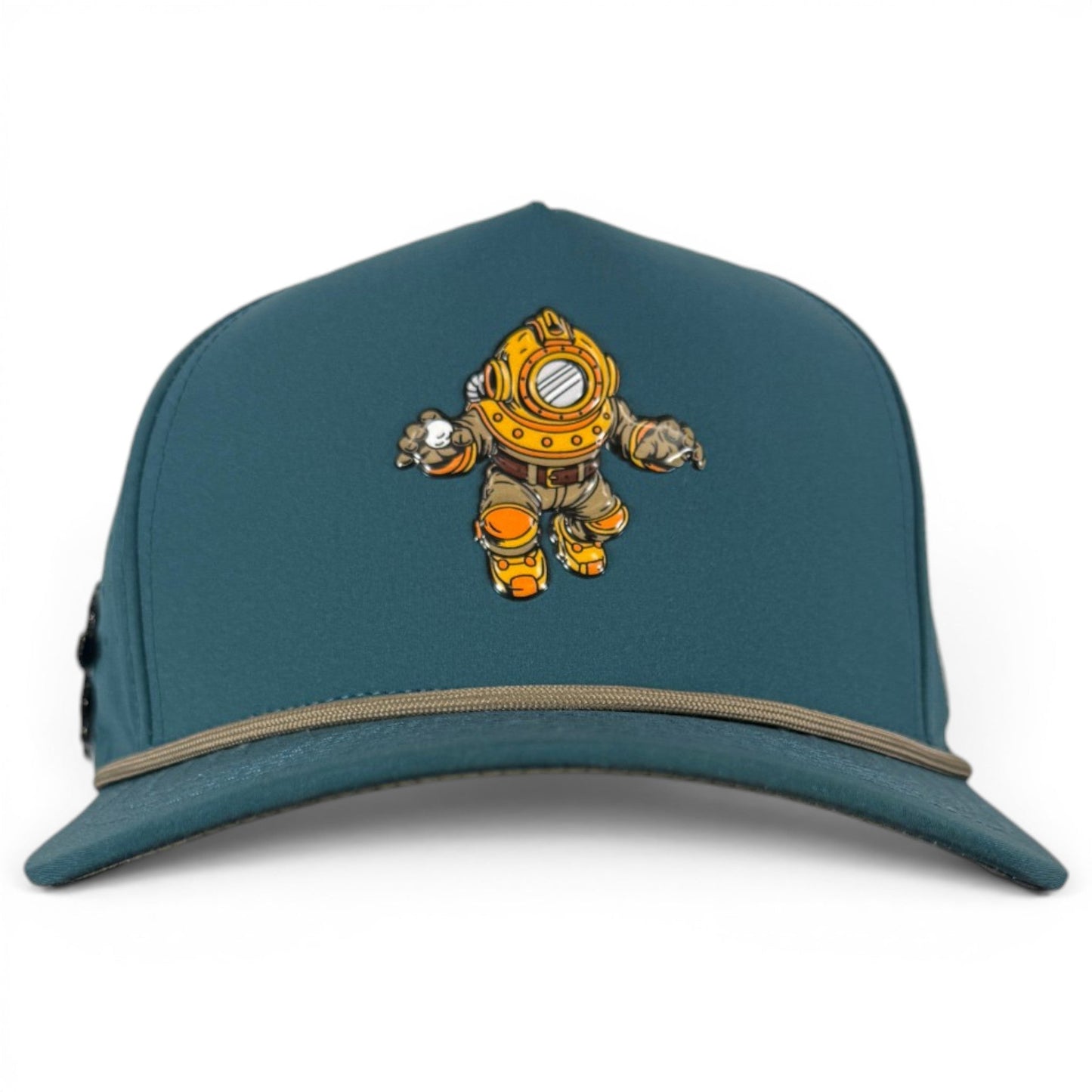 Introducing the Deep Dive Golf Hat from Logie Joe’s Golf—a teal snapback cap featuring an illustration of a vintage deep-sea diver in a yellow diving suit on the front. This adjustable hat comes equipped with a built-in magnetic ball marker holder and includes a marker for added convenience on the course.