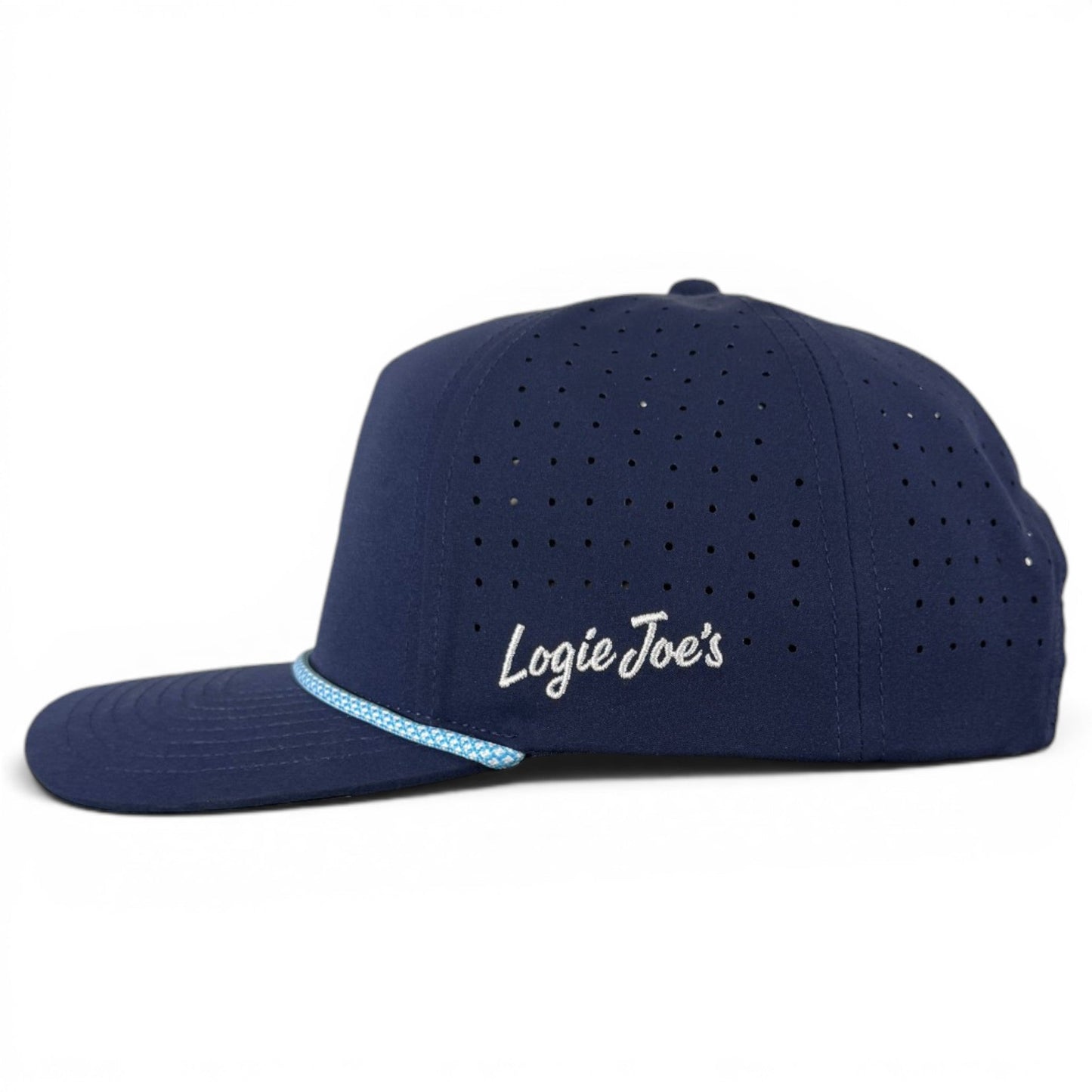 Navy blue Zero Chill Yeti Golf Hat snapback cap from Logie Joe’s Golf, featuring built-in magnetic ball marker holder with marker included. The hat is crafted with small ventilation holes for breathability and has “Logie Joe’s” embroidered in white on the side. A light blue and white rope detail, inspired by classic Yeti golf hat style, runs across the base of the front panel above the brim. Adjustable fit; Abominable Snowman design.