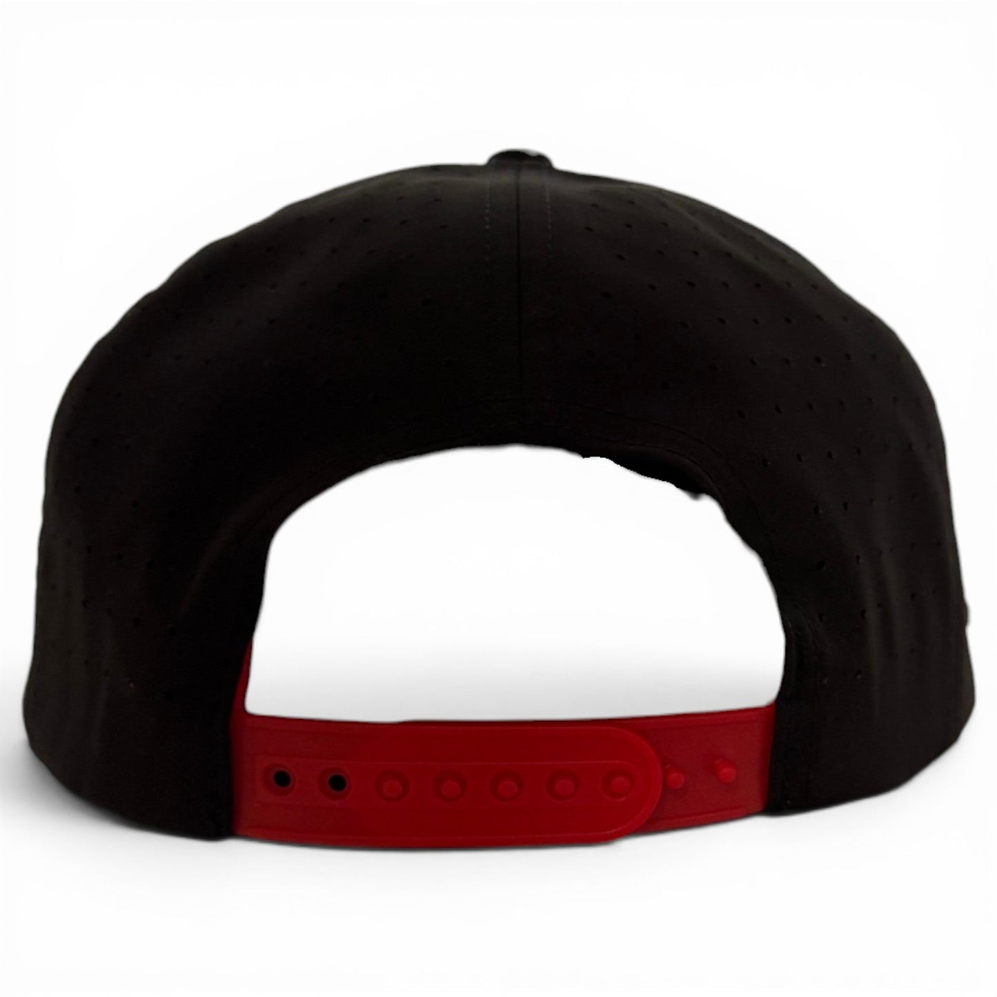 A black Jogie Loe’s Flamingo Golf Hat by Logie Joe’s Golf is shown from the back, highlighting a red adjustable snapback strap with several snap buttons against a plain white background. This stylish and practical snapback cap features a built-in magnetic ball marker holder with marker included, making it an ideal choice for your next round on the green.