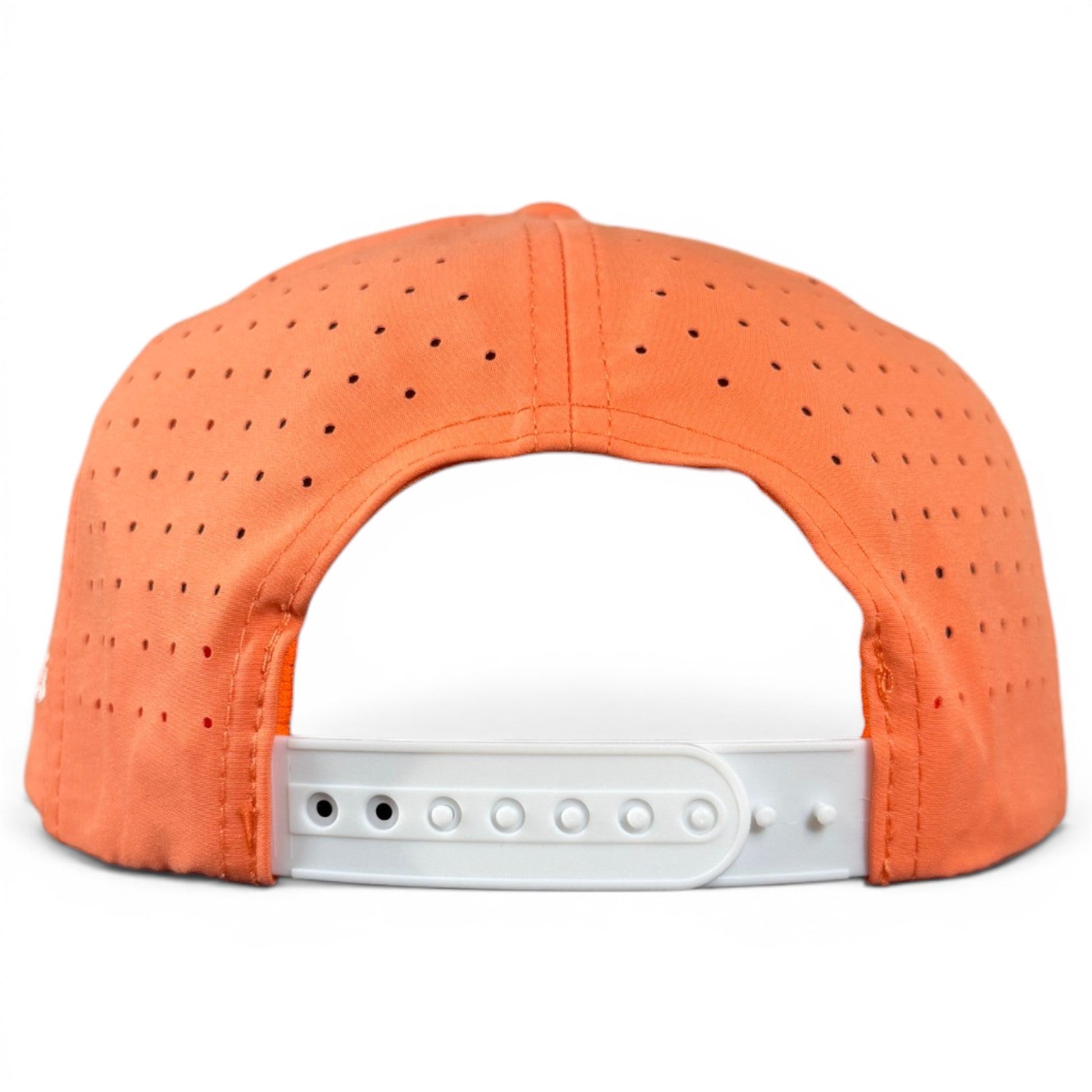 Here’s a rewritten version of the sentence using your product data: The back view of the Logie Joe’s Golf Orange Dream Golf Hat—a vibrant orange snapback cap featuring perforated panels, an adjustable white closure, and a built-in magnetic ball marker holder with marker included.