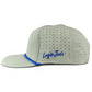 Light gray Angelfish Golf Hat by Logie Joe’s Golf, featuring a baseball cap design with small ventilation holes and “Logie Joe’s” embroidered in blue script on the side. This snapback cap includes a curved brim with a blue accent along the edge, an adjustable fit for extra comfort, and a built-in magnetic ball marker holder with marker included.