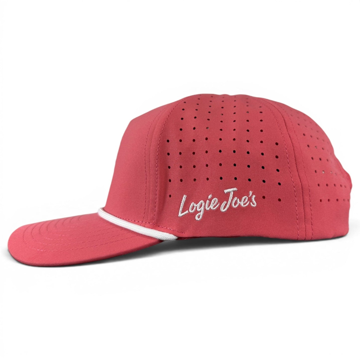A red snapback cap by Logie Joe’s Golf, the Redfoot Birdie Golf Hat, features small ventilation holes and “Logie Joes” embroidered in white on the side. Inspired by the classic design, this adjustable hat includes a built-in magnetic ball marker holder with marker and displays a white trim above the brim. The product is shown on a plain white background.