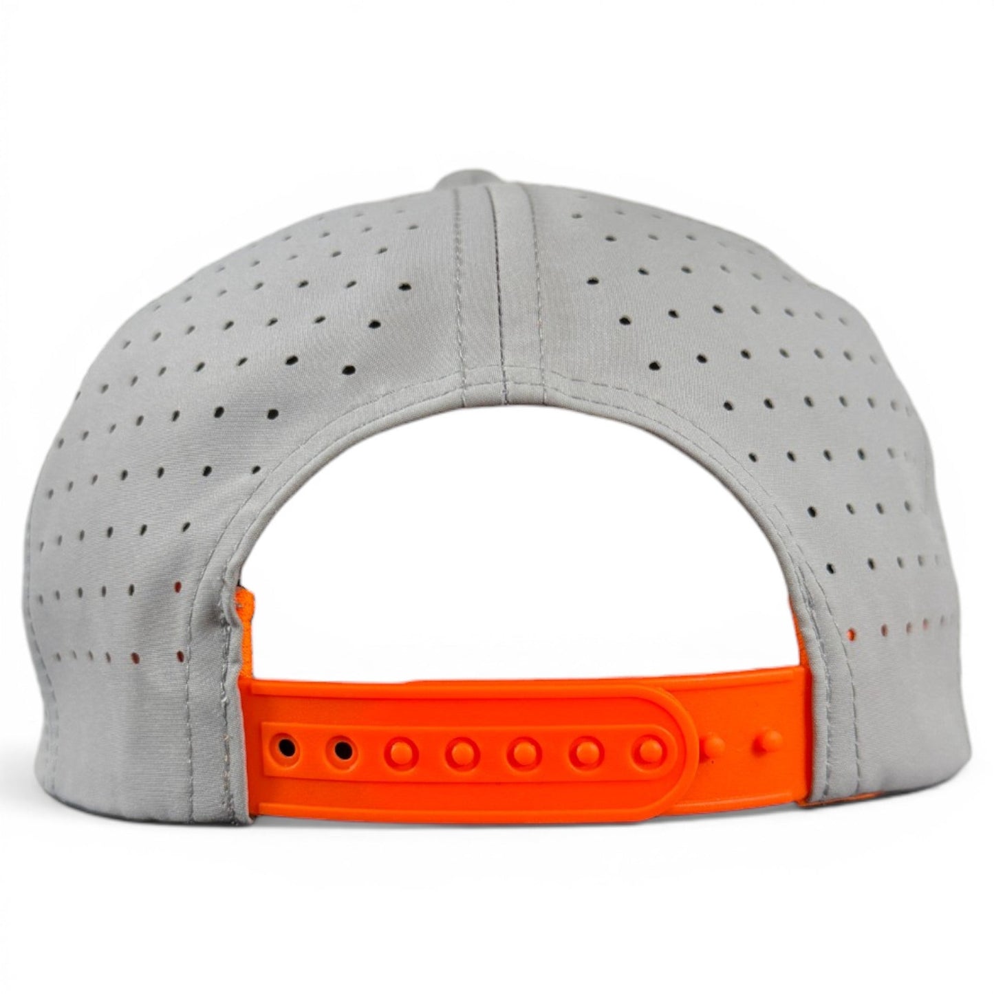 A close-up of the back of a light gray perforated Logie Joe’s Golf Fossil Fairway Golf Hat, featuring an adjustable bright orange plastic snapback closure. This snapback cap includes a built-in magnetic ball marker holder with marker included.