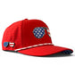 Introducing the Red, White & View Golf Hat by Logie Joe’s Golf—a patriotic snapback cap featuring a bold red color, perforated side panels for breathability, and a white rope detail across the brim. This adjustable hat comes complete with American flag sunglasses and an American flag pin, plus a built-in magnetic ball marker holder with marker included. The underside of the brim showcases an eye-catching American flag pattern, making it your go-to USA-themed golf hat for any round.