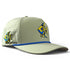 Introducing the Logie Joe’s Golf Angelfish Golf Hat: a light gray snapback cap featuring a blue and yellow angelfish logo on both the front and side. This adjustable hat is designed with small ventilation holes for breathability, a blue accent line above the brim, and includes a built-in magnetic ball marker holder along with a marker—providing added convenience for your time on the course.
