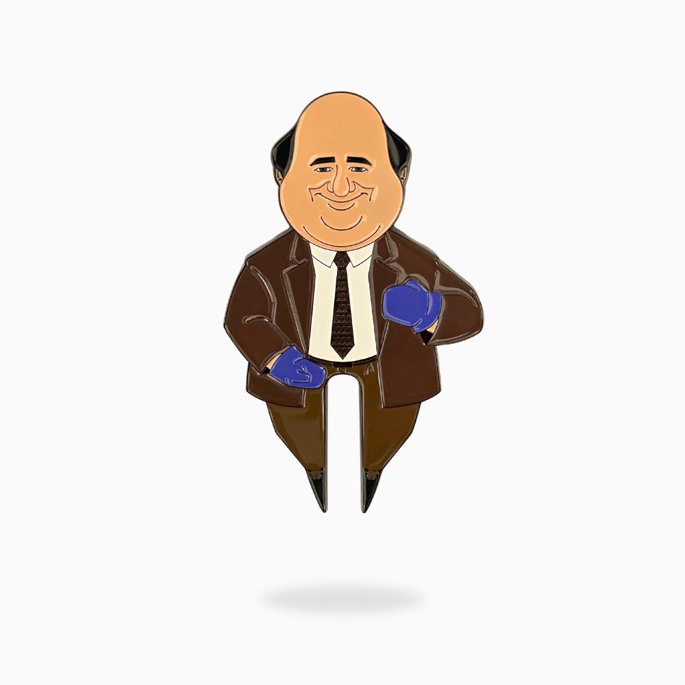 A quirky cartoon-style pin by Pin Creatures featuring a bald man in a brown suit and blue gloves—perfect as the Chili Cook Off Divot Tool for golf enthusiasts or fans of unique accessories.