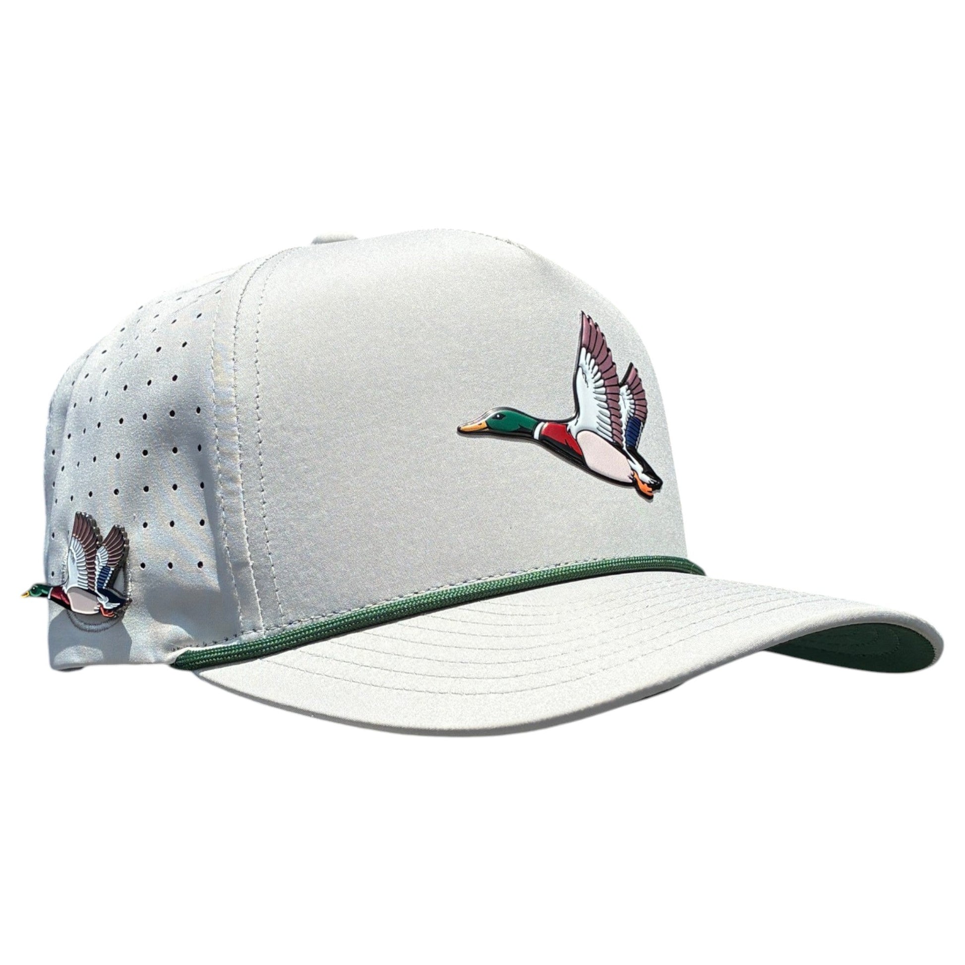 The Mallard Golf Hat by Logie Joe's Golf is a light gray adjustable snapback cap with green trim, embroidered mallard ducks, side ventilation holes, and a built-in magnetic ball marker holder with marker included.