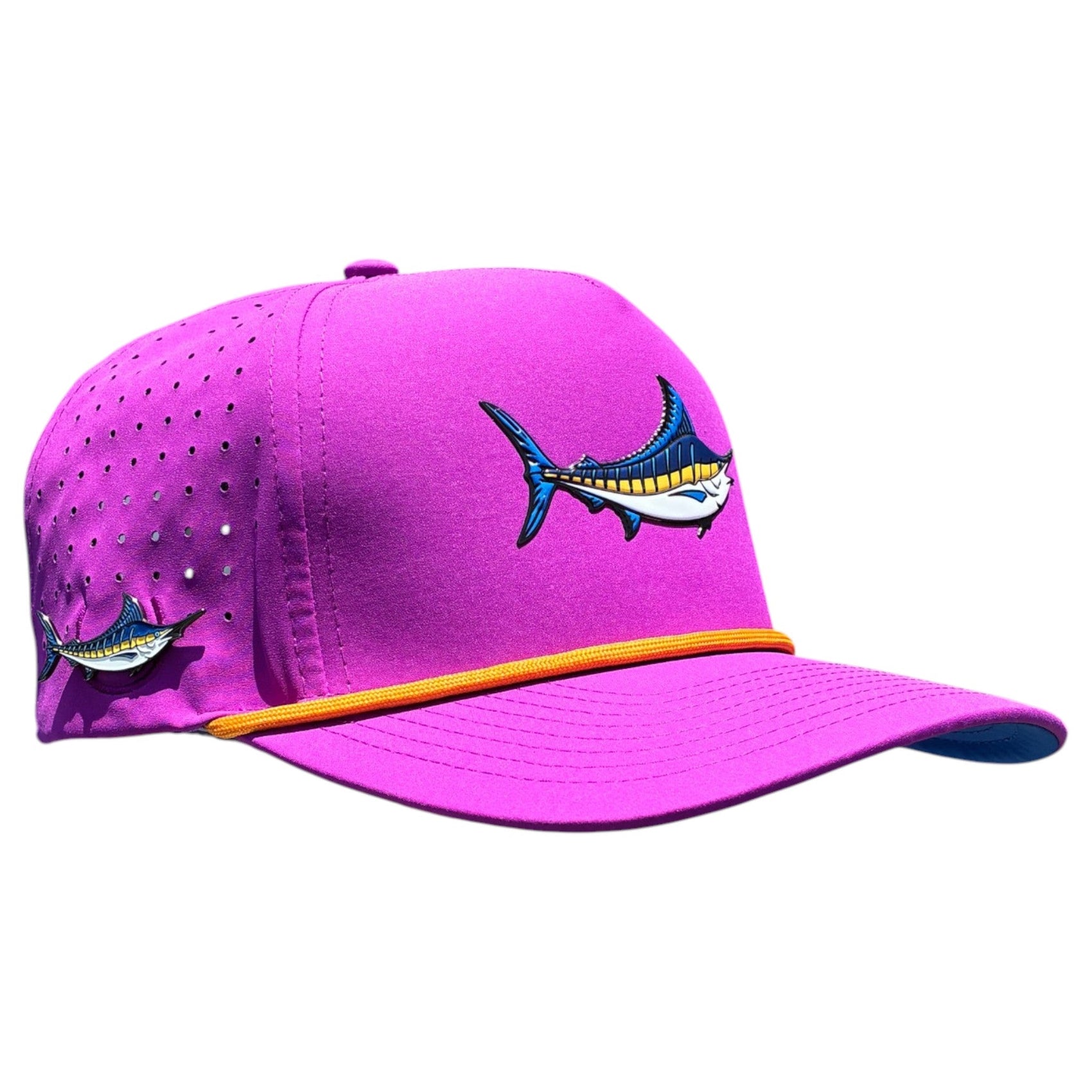 The Logie Joe's Golf Marlin Golf Hat is a bright purple adjustable snapback cap with yellow trim, fish graphics, side ventilation holes, and a built-in magnetic ball marker holder plus marker.