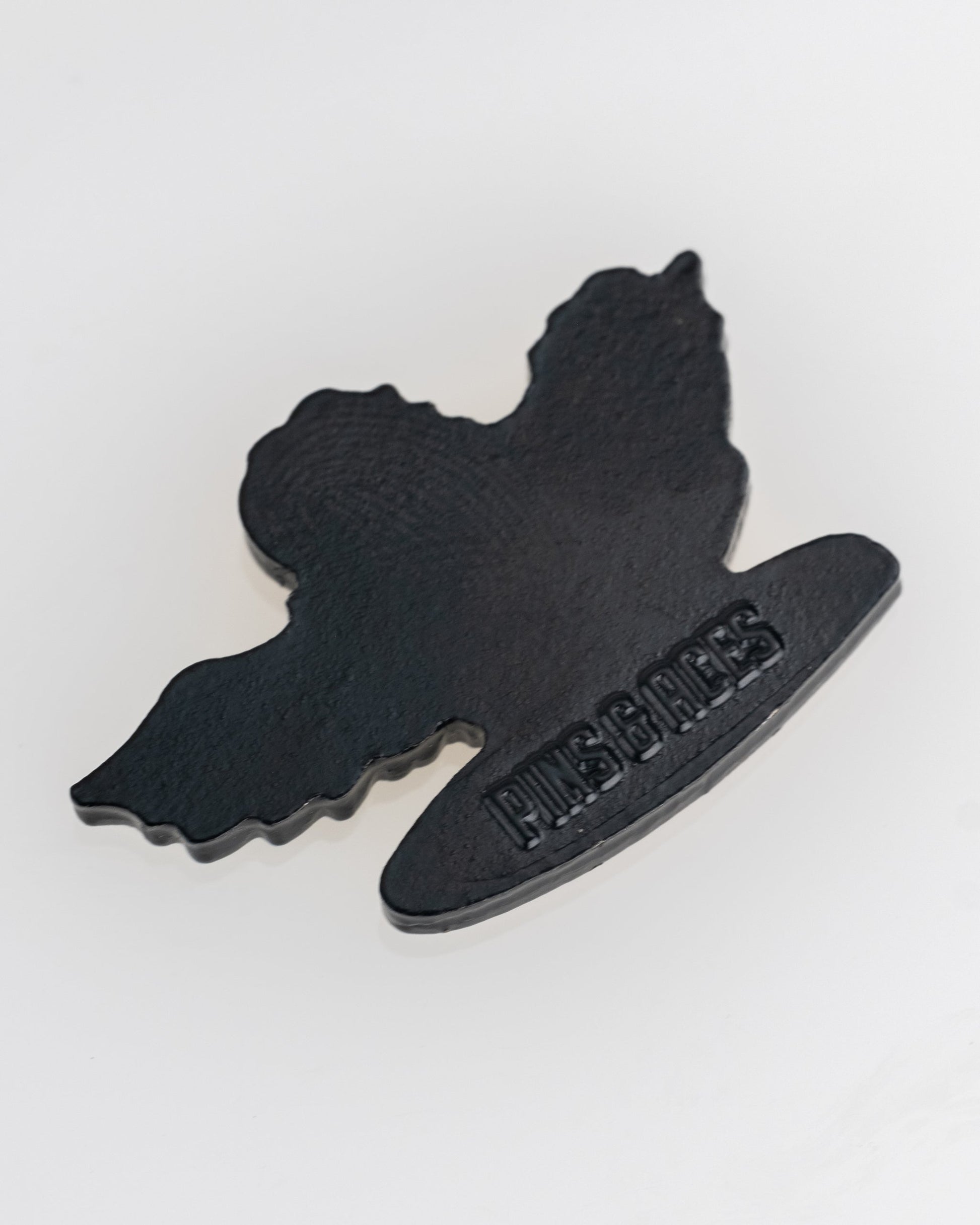 The Margaritaville - Surfing Parrot Ball Marker by Pins and Aces is a unique golf accessory, featuring a fun parrot design and premium quality, making it a standout addition to any golfer’s collection. Displayed on a white background.