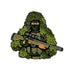 Illustration of a person in a green camouflage ghillie suit, holding a sniper rifle with only the eyes visible—resembling the Sniper Ball Marker golf accessory by Ballmarkers.com, set against a white background.