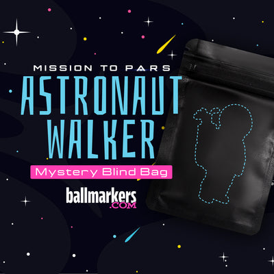 A black resealable bag featuring a dotted outline of an astronaut surrounded by stars, set against a space-themed background. The text reads: Astronaut Walker Mystery Blind Bag by Ballmarkers.com. Perfect for any golf ball marker enthusiast.