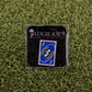 A Mulligan Reverse Card Blue pin by Logie Joe’s Golf is shown in packaging on grass. Ideal for premium golf accessory fans, the pin features NEILLIGAN, NEAPITAN, and reverse arrows.
