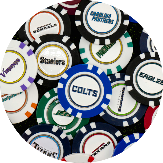 The NFL Team Ball Markers by NFL are arranged in a circle on green felt, each featuring the name and logo of teams like the Colts, Panthers, Steelers, Vikings, Bengals, Eagles, and more.