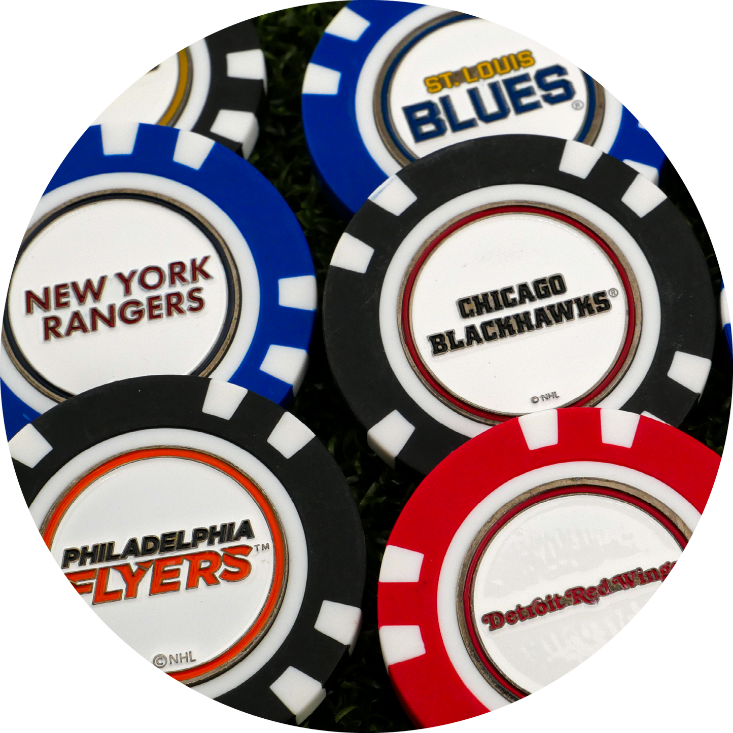 NHL Team Ball Markers by NHL, featuring logos of the St. Louis Blues, Chicago Blackhawks, New York Rangers, Philadelphia Flyers, and Detroit Red Wings, are displayed closely together on a surface.