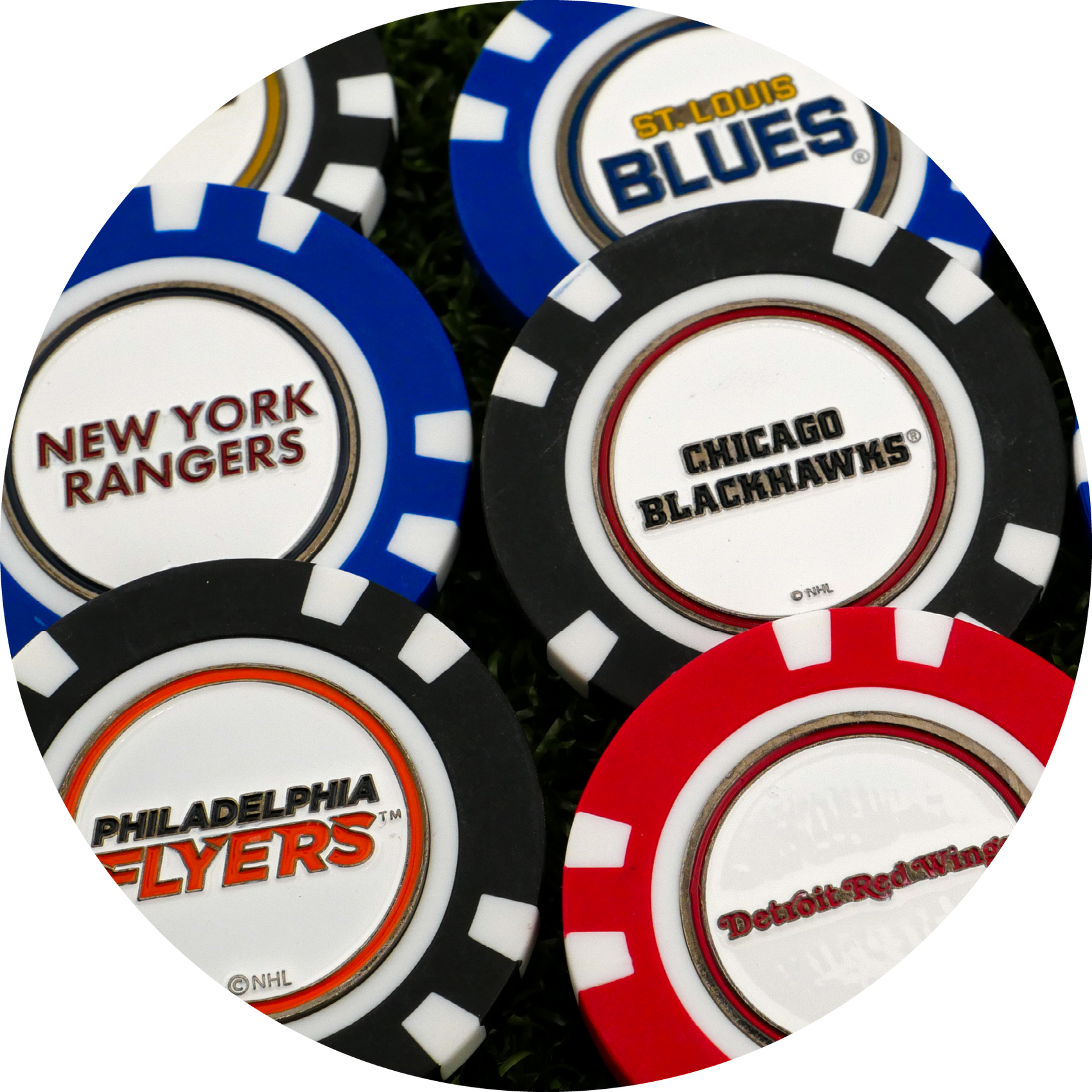 NHL Team Ball Markers by NHL, featuring logos of the St. Louis Blues, Chicago Blackhawks, New York Rangers, Philadelphia Flyers, and Detroit Red Wings, are displayed closely together on a surface.