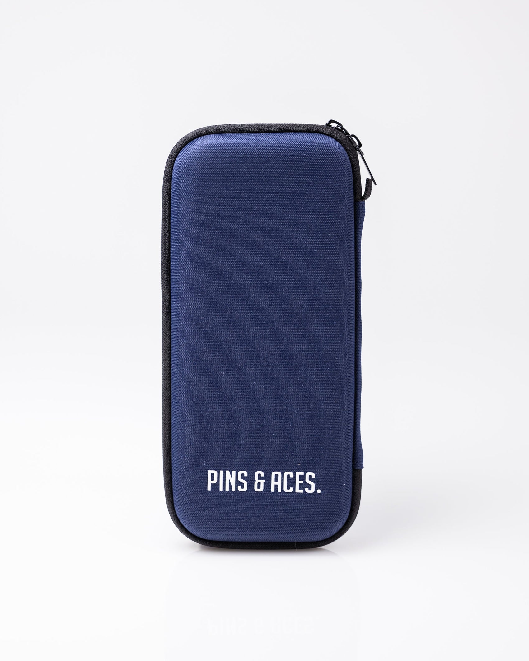 The Pins and Aces Glove & Accessory Caddie in navy stands upright on a white background, featuring white "PINS & ACES." lettering on the front.