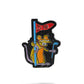 The Range Rat Ball Marker by Pins and Aces features a vibrant cartoon rat with a mischievous grin, holding a golf club and standing by a PGA flag—perfect for adding fun to your golf gear or using as an enamel paint design.