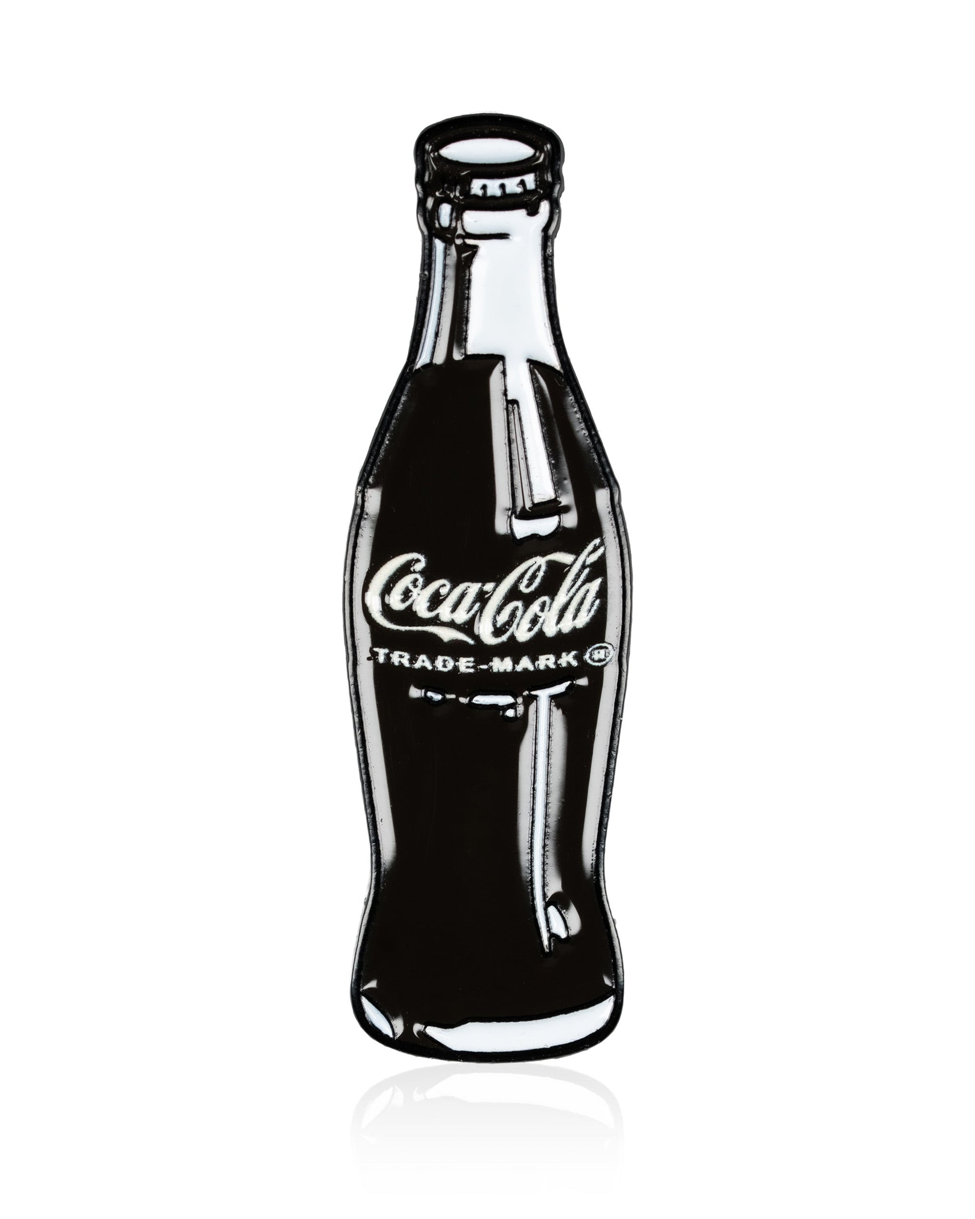 The Pins and Aces Coca-Cola Bottle - Ball Marker features a classic glass Coke bottle design with logo and TRADE-MARK text, shown on a white background alongside a stainless steel golf ball marker.