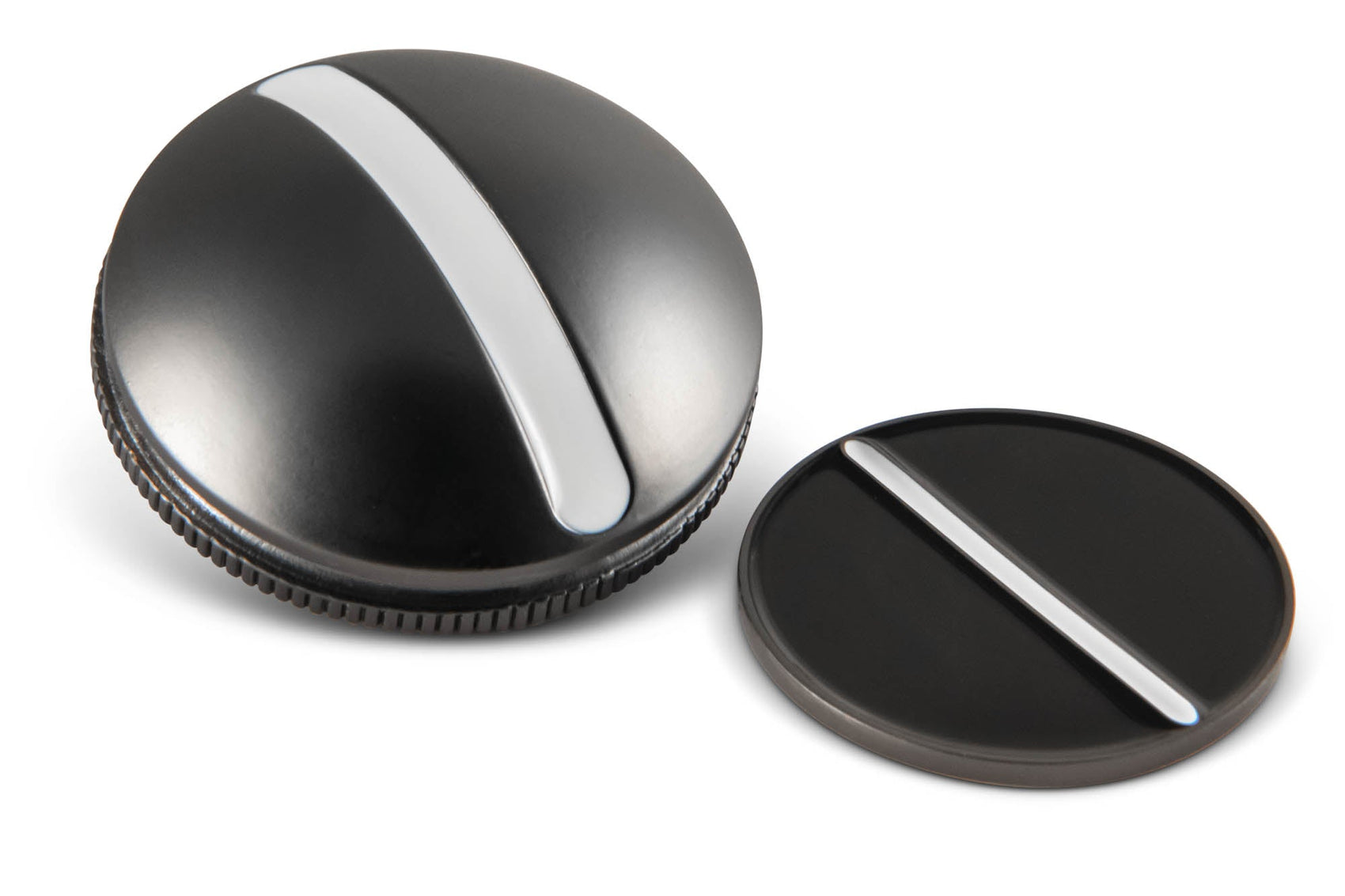 Two round black One Rail Smooth Ball Markers from OnPointGolf.us, each featuring a shiny silver stripe, function as stylish 3D golf alignment tools and are displayed on a white background.