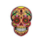 The Logie Joe's Golf Orange Sugar Skull ball marker features vibrant patterns, floral designs, and heart shapes inspired by Día de los Muertos—an eye-catching addition to your premium golf accessories collection.