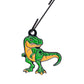 The Pins and Aces T-Rex Ornament is a green and orange cartoon dinosaur keychain, perfect for your golf bag as a fun Christmas accessory, shown hanging from a black hook against a white background.