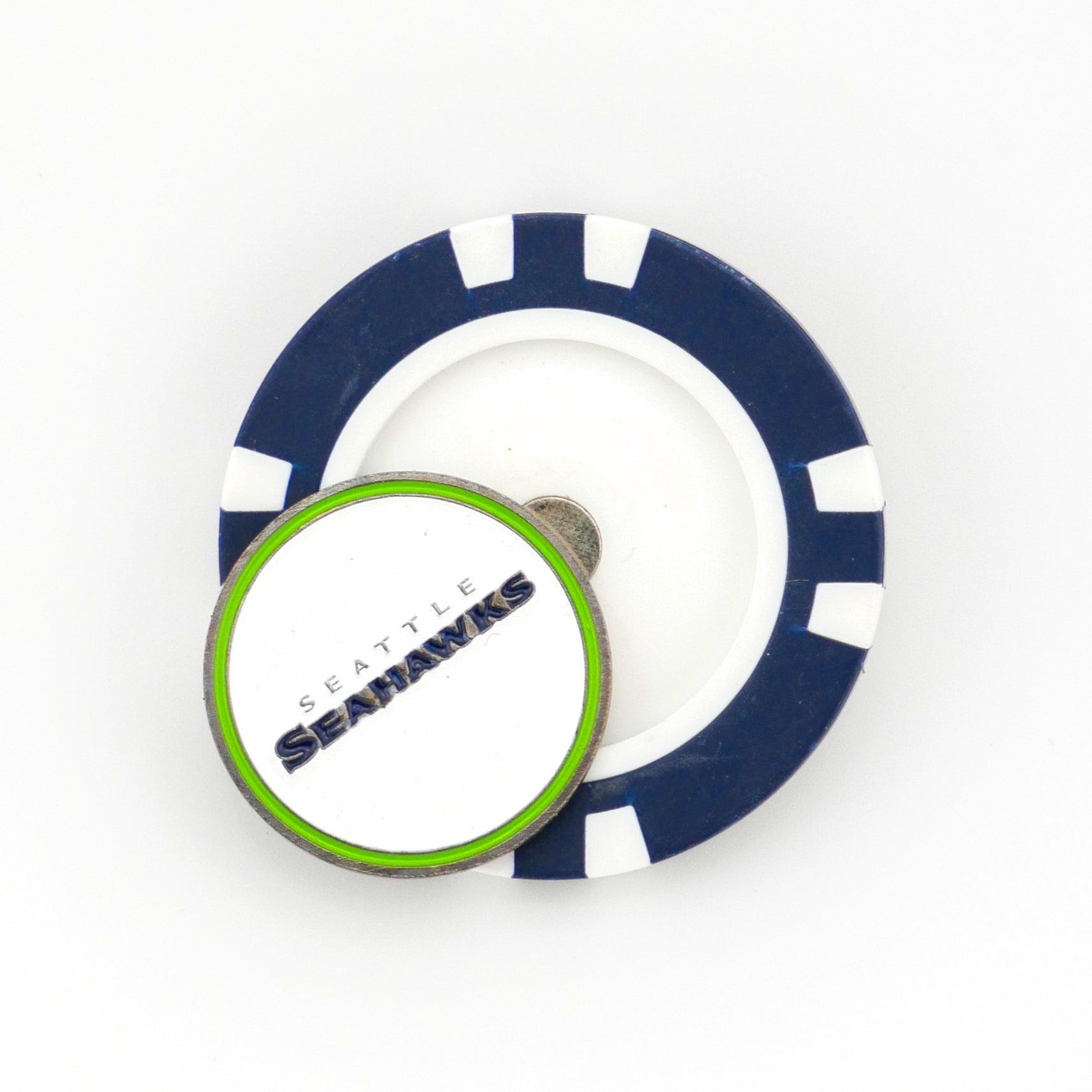 A blue-and-white poker chip-style marker by Ballmarkers.com, topped with a Seattle Seahawks ball marker featuring the team logo and name in blue and green, displayed against a white background.