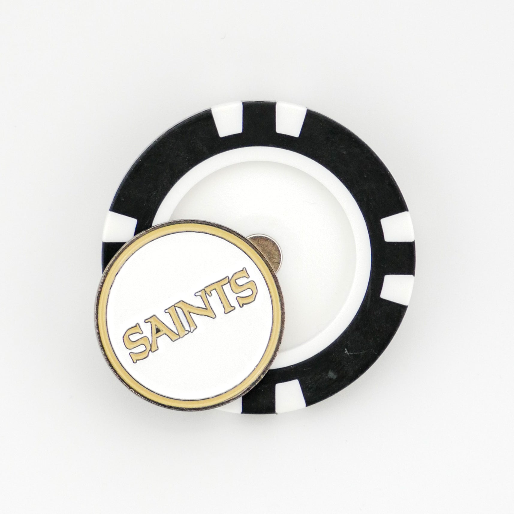 A black and white Ballmarkers.com golf poker chip marker with a circular New Orleans Saints token on top, set against a plain white background—an ideal choice for funny golf gifts.
