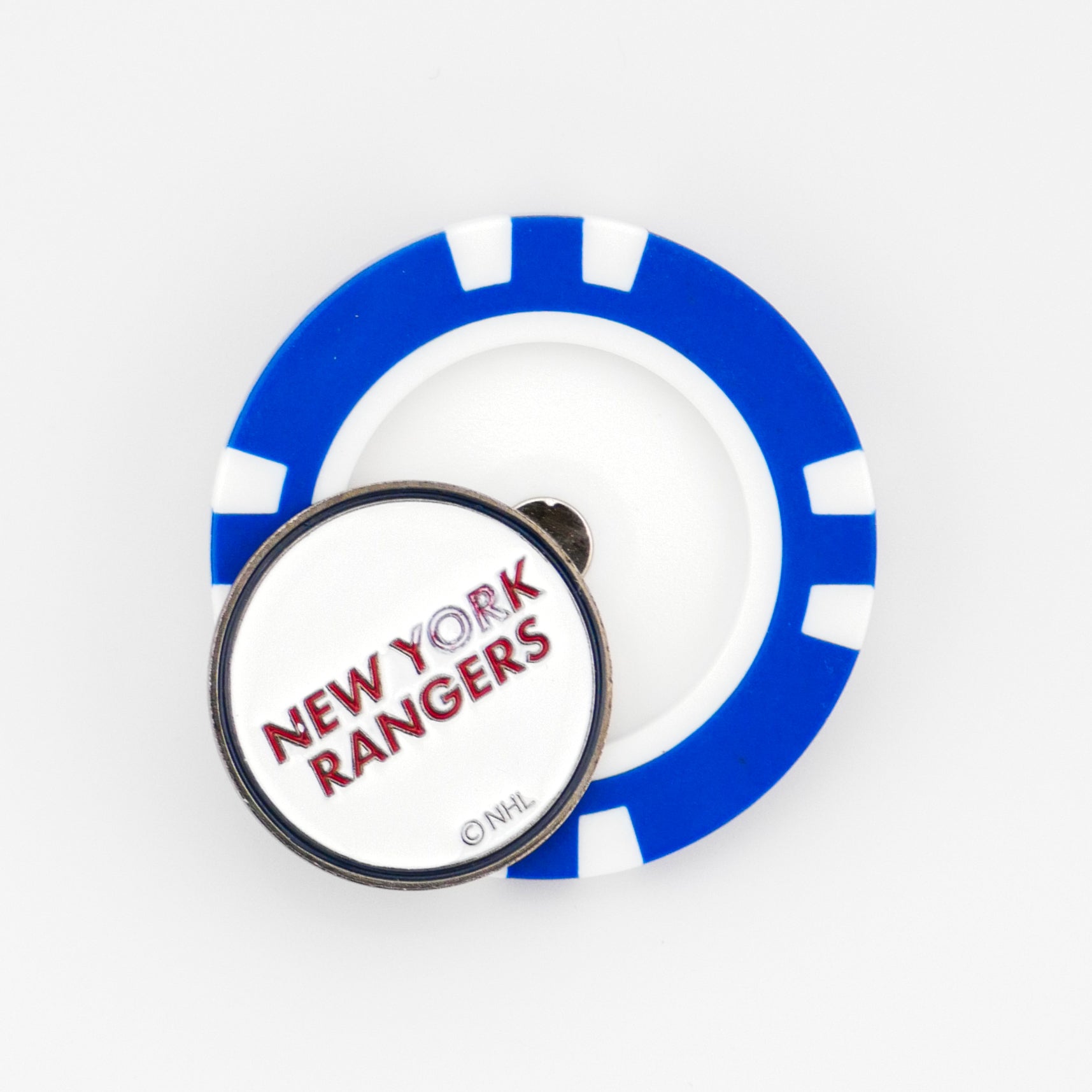 The Ballmarkers by Logie Joes New York Rangers golf ball marker features a blue and white poker chip design with NEW YORK RANGERS in red and the NHL logo—ideal for any golf-loving hockey fan.