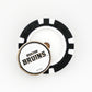 A Ballmarkers by Logie Joes Boston Bruins NHL pin sits atop a black and white poker chip, both displayed on a plain white background.