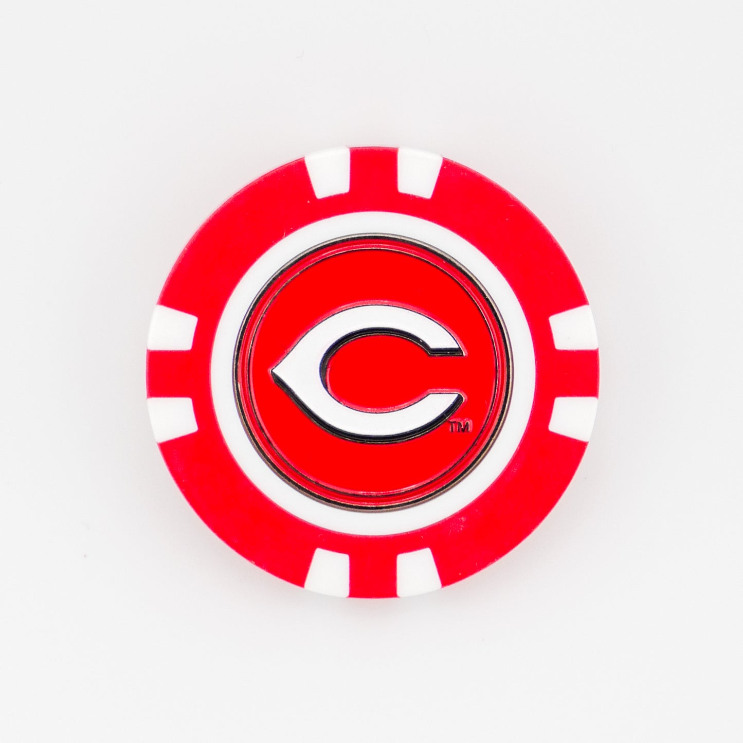 A red and white poker chip ball marker from Ballmarkers.com featuring the Cincinnati Reds logo—a stylized white C outlined in black and red.