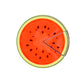 The Logie Joe's Golf Watermelon "Slice" Premium Ball Marker features a round design like a watermelon slice, with a removable triangular piece, red interior with black seeds, light green rind, and dark green edge on white.