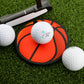 Three golf balls and a putter rest on artificial grass, with the Logie Joe's Golf Basketball Putting Disk—a disk styled like a basketball—at the center. Great for focused putting practice and stroke training.