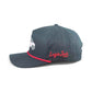 The Logie Joe's Golf Free Golf Balls Van Snapback Hat features a dark gray design with ventilation holes, a pink and white van graphic, red stripe, side logo embroidery, and a matching magnetic ball marker for convenience.
