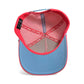 A close-up of the Frosted Elephant Snapback Hat + Matching Ball Marker by Logie Joe's Golf shows its perforated pink lining, interior labels, and stitched brim.
