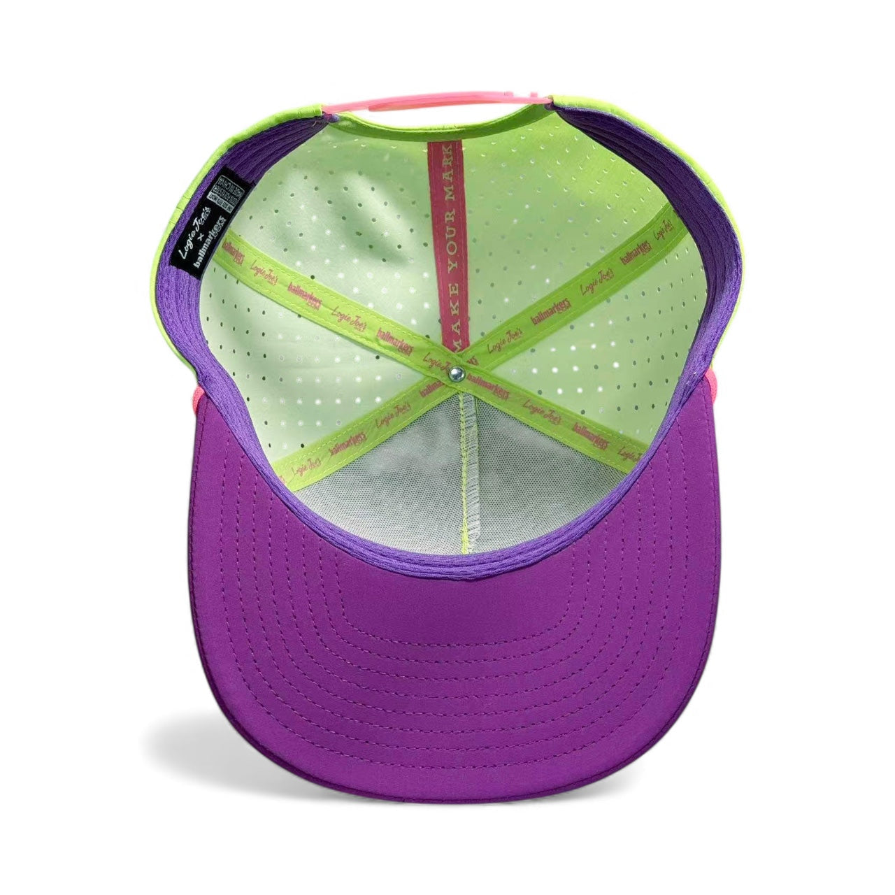 The I'd Hit That Piñata Golf Hat by Logie Joe's Golf features a purple brim, light green panels, pink and yellow accents, plus built-in magnetic ball marker. Adjustable snapback with unique Llama multicolor design—perfect for making your mark on the course.
